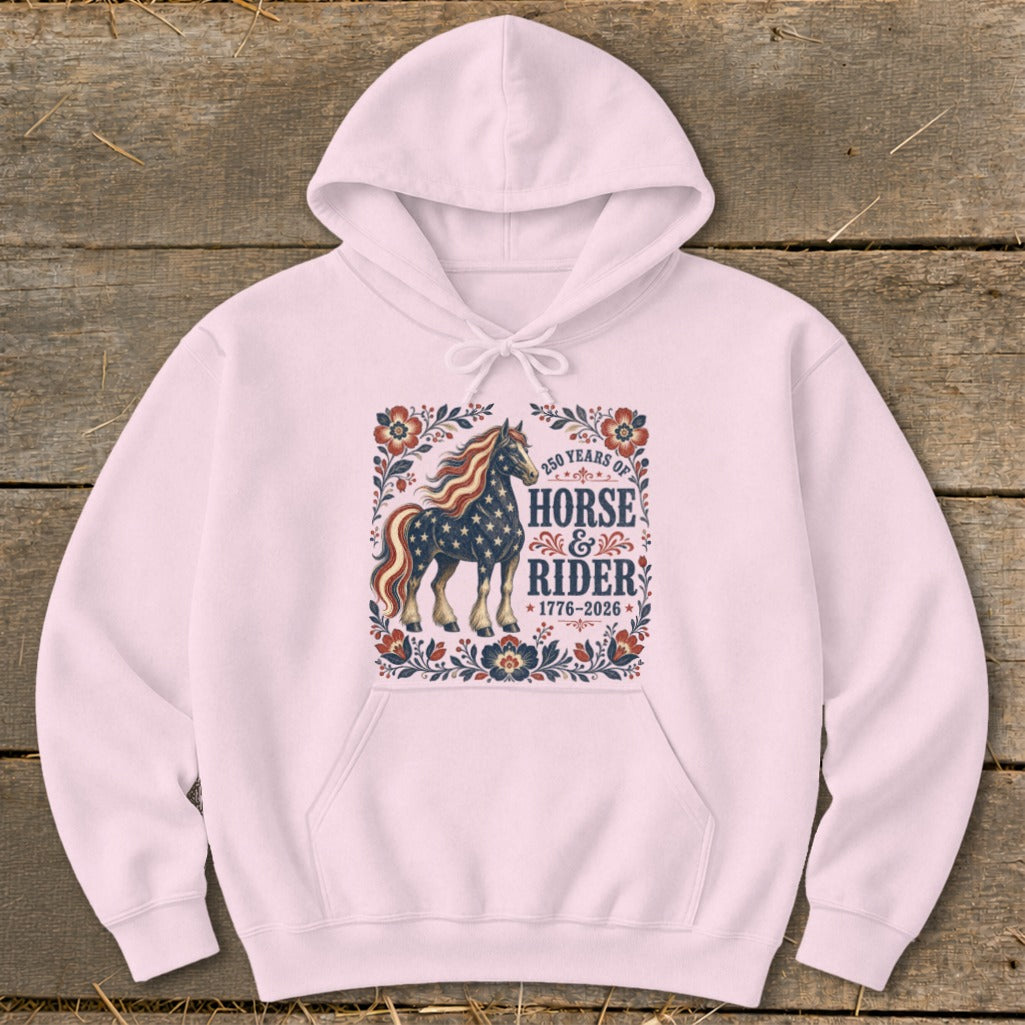Pink hoodie with "250 Years of Horse & Rider 1776-2026" and patriotic horse design.