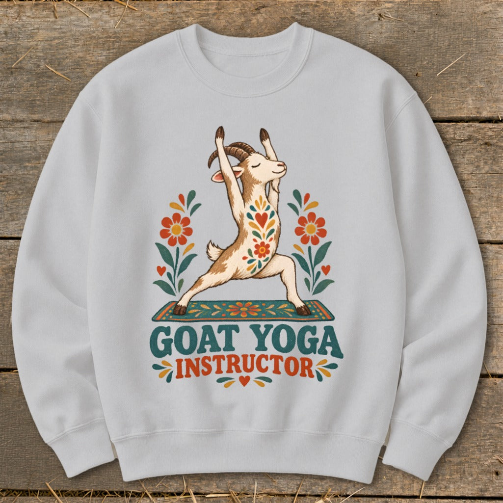 Light grey sweatshirt with goat yoga instructor graphic and floral accents.