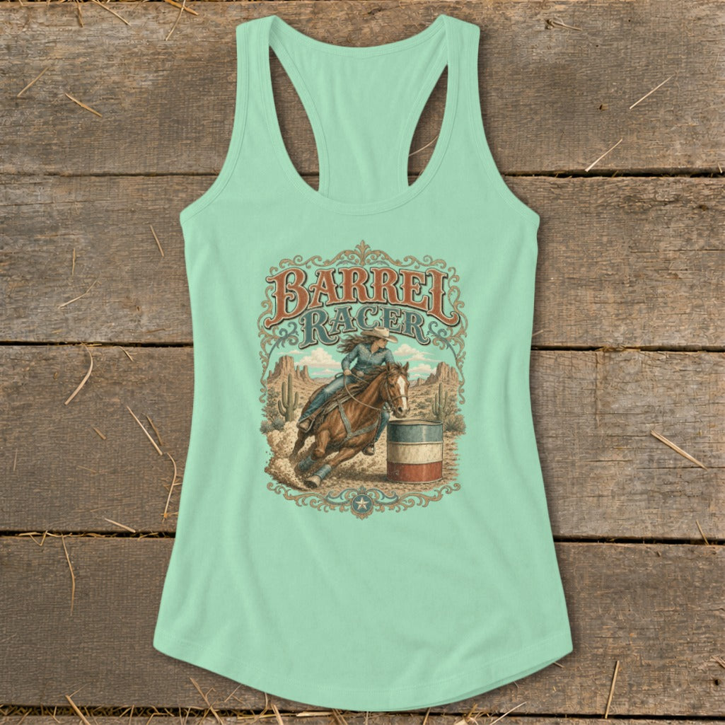 Barrel racer on horseback around a barrel in a desert landscape.