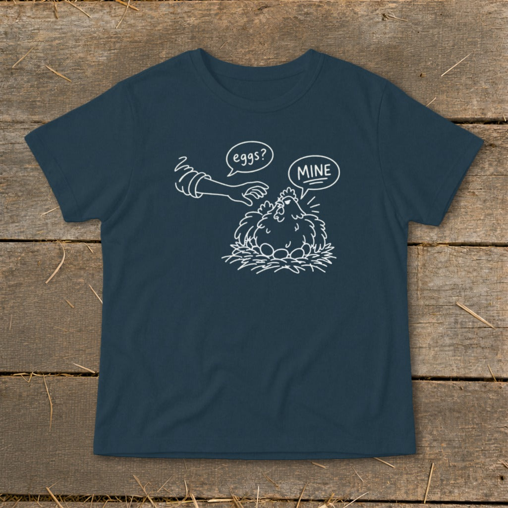 T-shirt with white line drawing of a chicken and eggs, and speech bubbles.
