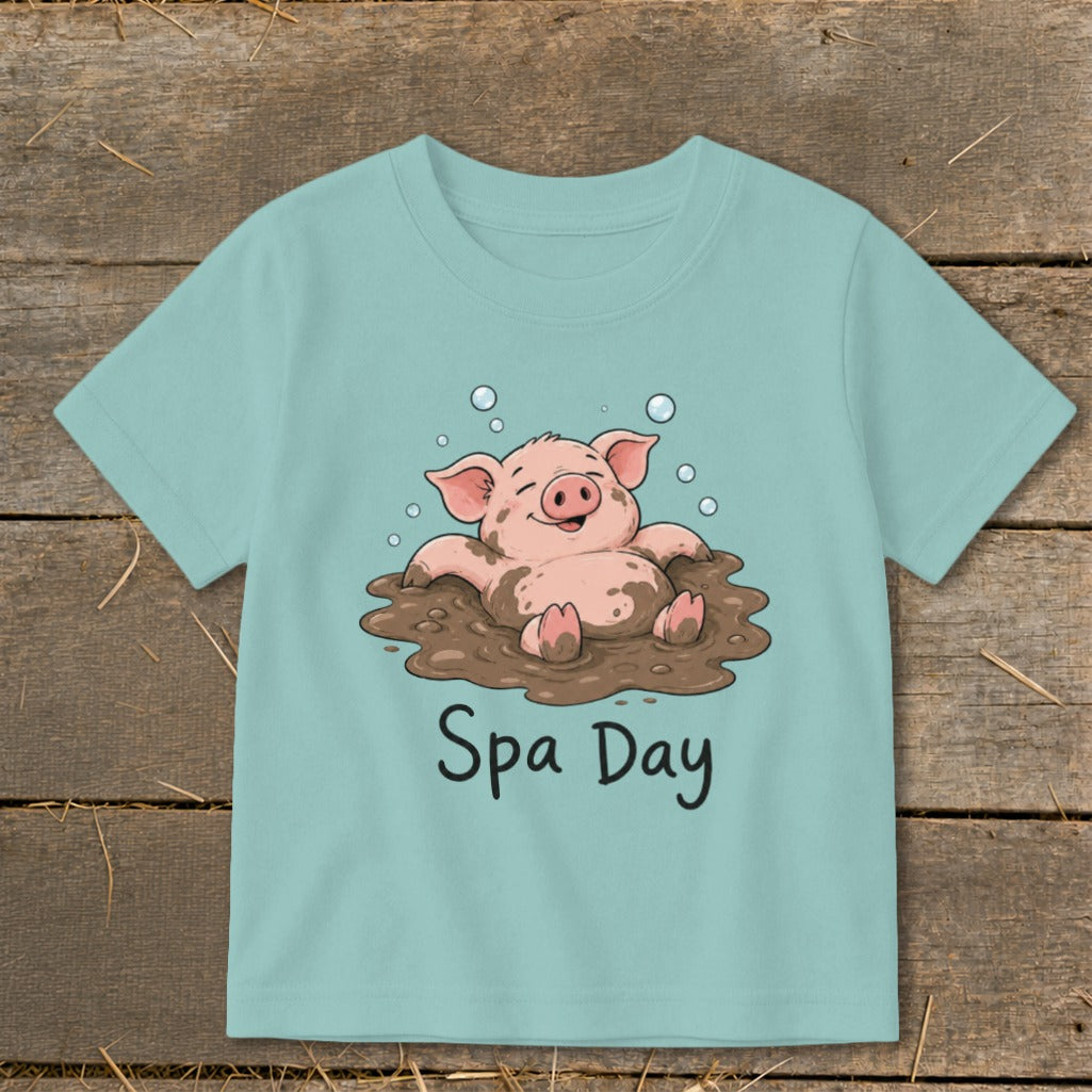 Cute pig enjoying a mud spa day, text "Spa Day" printed below.