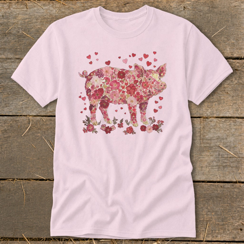 Pink t-shirt with a pig graphic made of red and pink flowers and hearts.