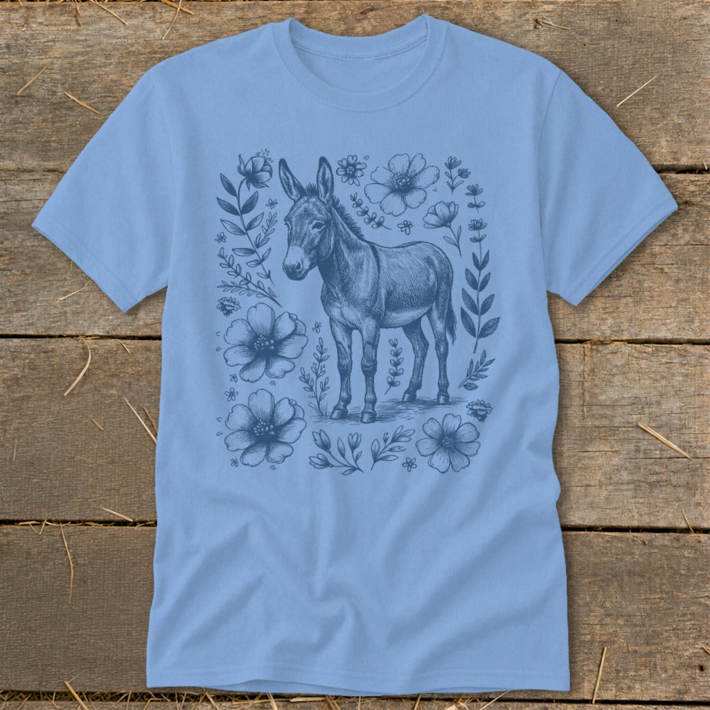 Light blue t-shirt with a vintage sketch of a donkey and floral elements.