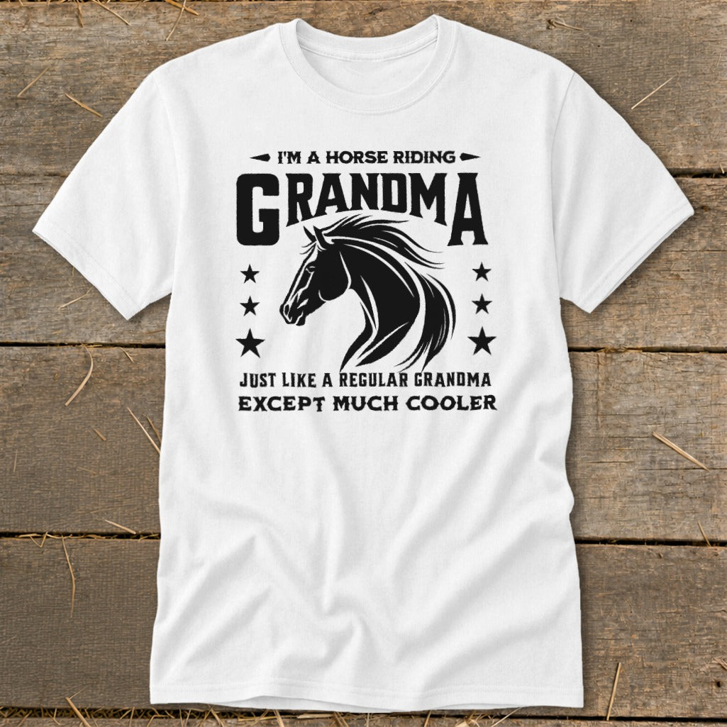 White t-shirt with black graphic text "I'm a Horse Riding Grandma" and horse silhouette.