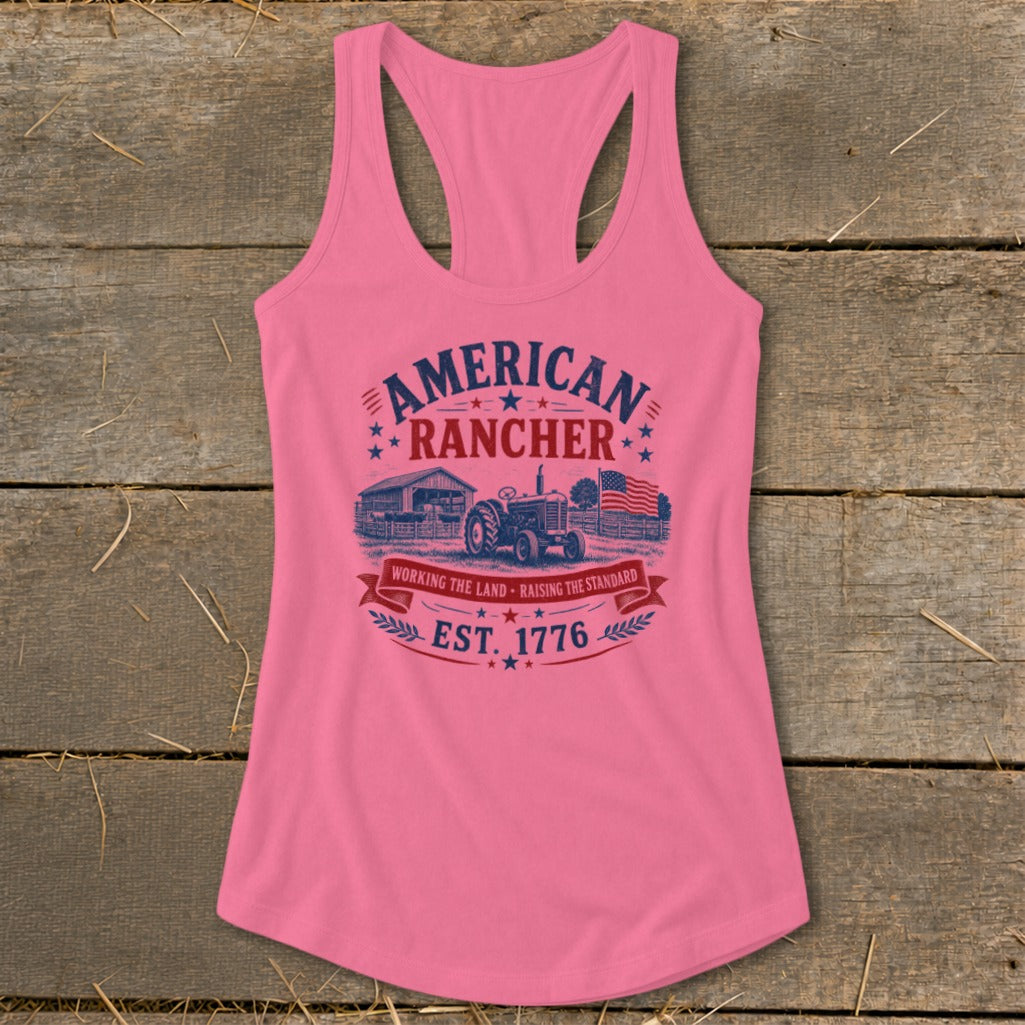 Pink tank top with "American Rancher" graphic featuring a tractor, barn, and flag.