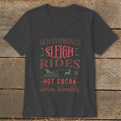 Dark gray v-neck t-shirt with "Old Fashioned Sleigh Rides Hot Cocoa Warm Blankets" text.