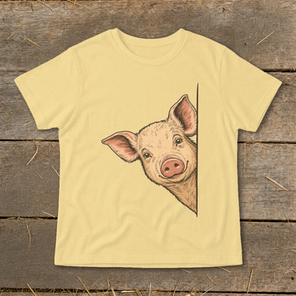 Pale yellow t-shirt with a drawing of a pig peeking from the side.