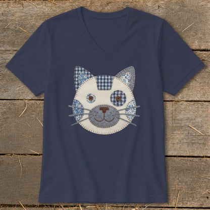 Navy v-neck t-shirt with a blue and white patchwork cat face applique.