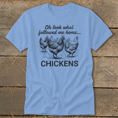 Light blue t-shirt with chickens and text "Oh look what followed me home... CHICKENS."