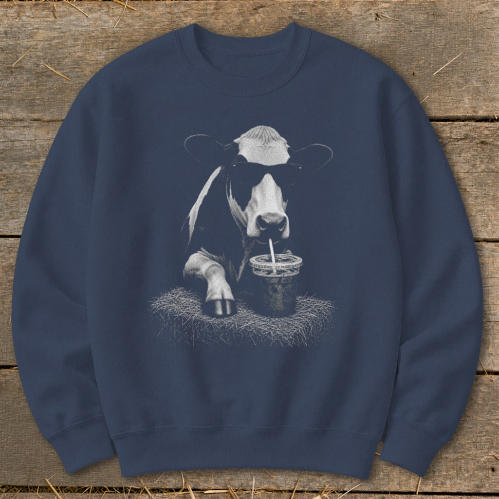 Navy sweatshirt with a black and white graphic of a cow wearing sunglasses drinking from a straw.