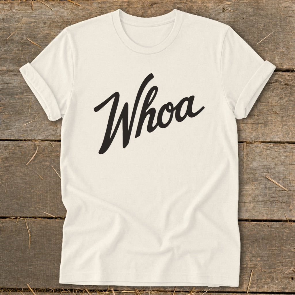 Cream t-shirt with black script text that says "Whoa"