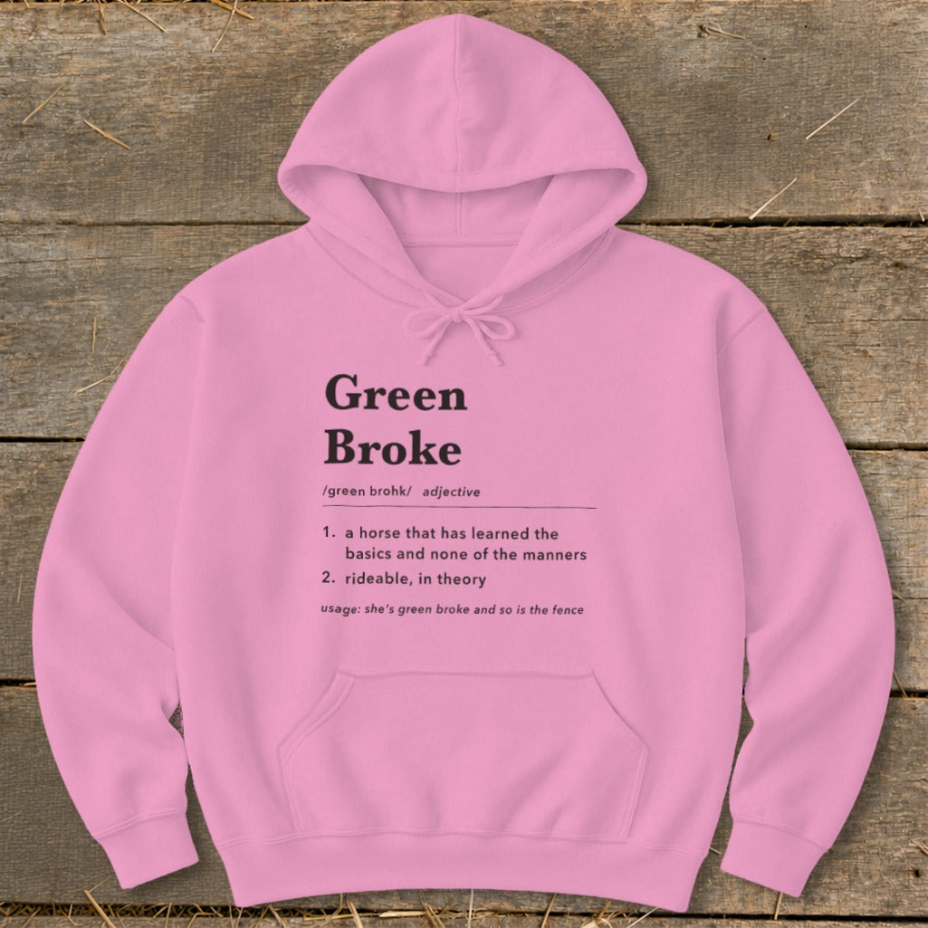 A light pink hoodie with a hood, drawstring, and front pocket, featuring dictionary definition text for Green Broke.