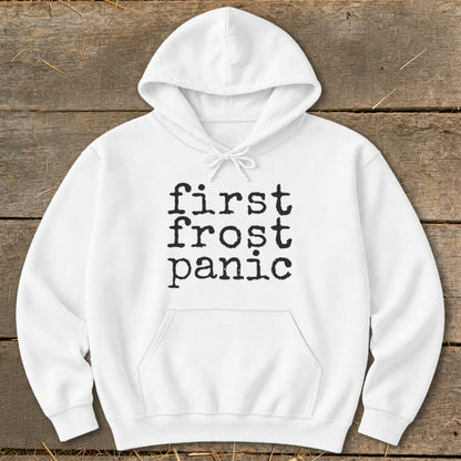 White hoodie with "first frost panic" text in black typewriter font.