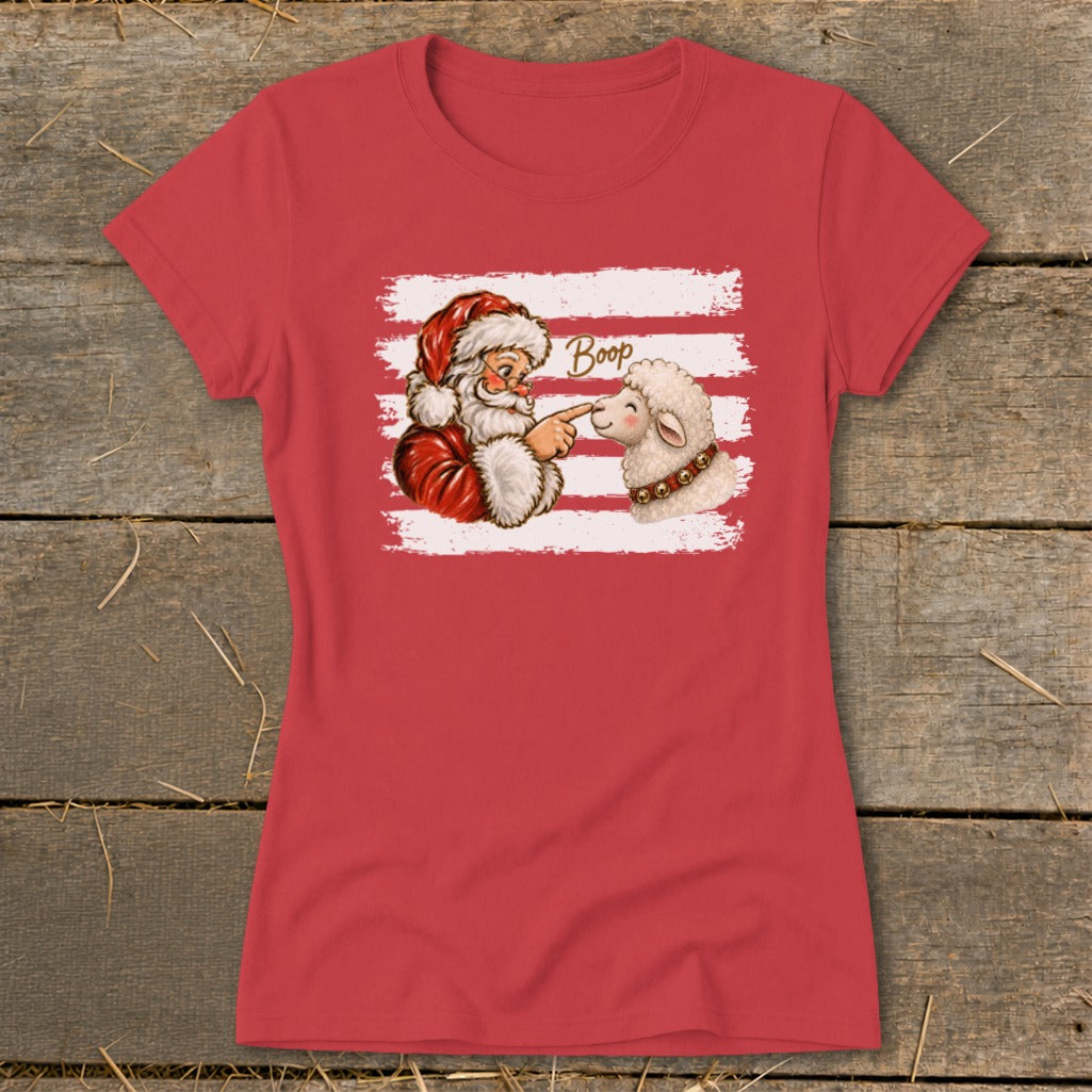 Santa boops a sheep on the nose with the word "Boop" above.