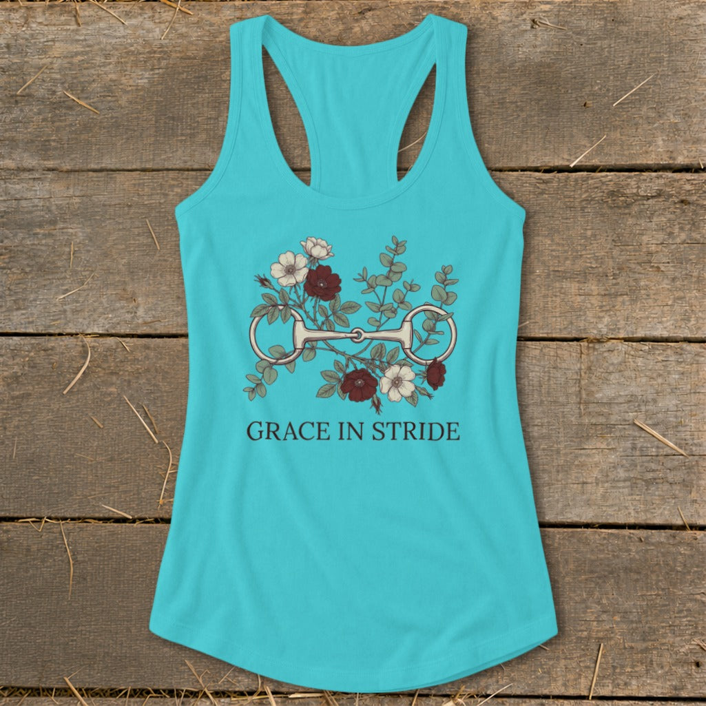 Turquoise tank top with a horse bit and floral graphic, and text "GRACE IN STRIDE".