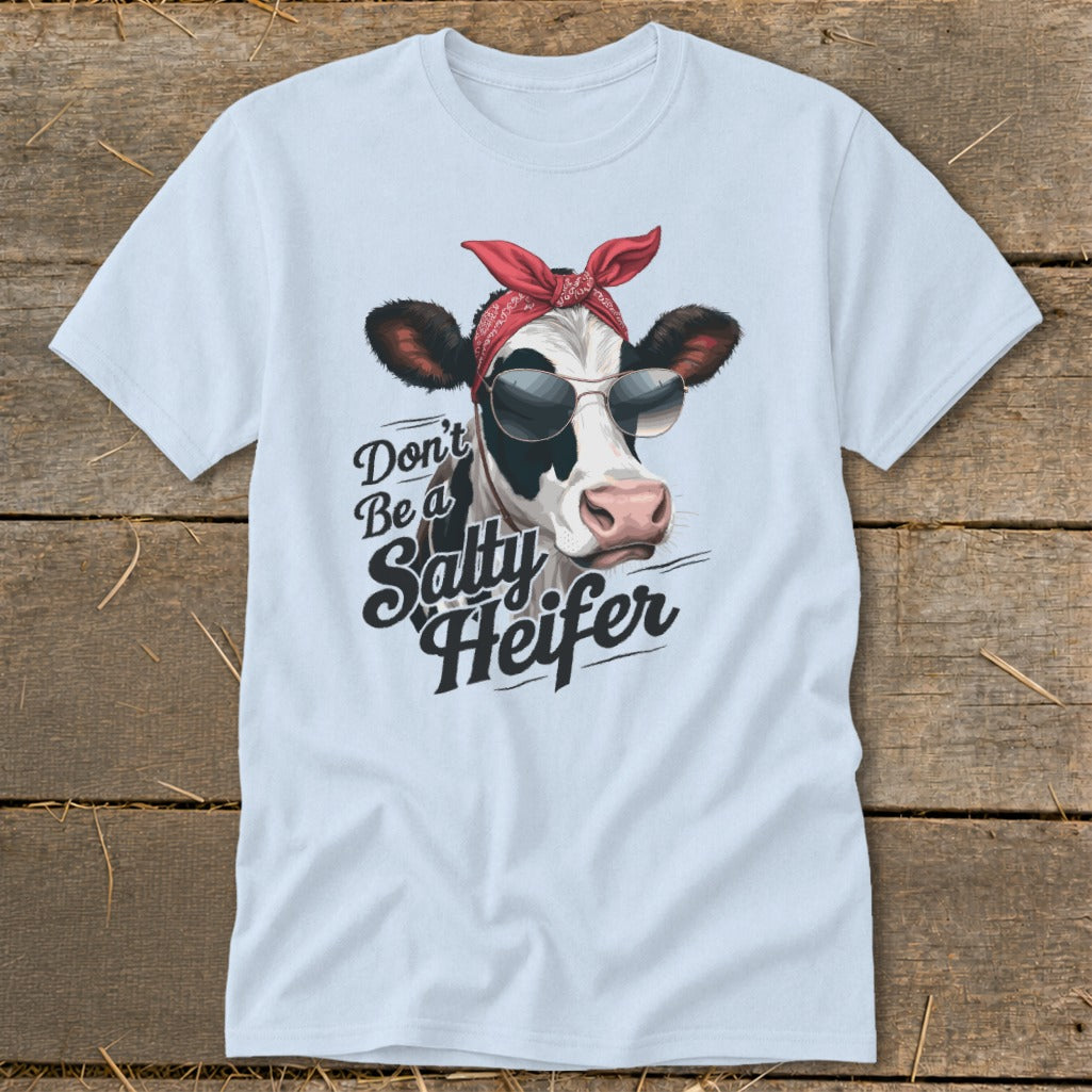 Light blue t-shirt with a cow wearing sunglasses and a red bandana, text says "Don't Be a Salty Heifer".