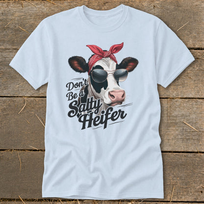 Light blue t-shirt with a cow wearing sunglasses and a red bandana, text says "Don't Be a Salty Heifer".