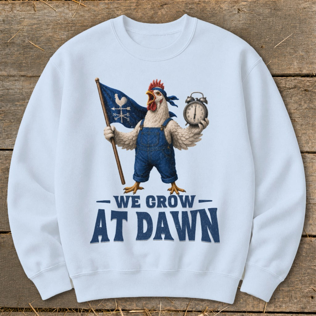 Chicken in overalls holds flag and alarm clock, text "WE GROW AT DAWN".
