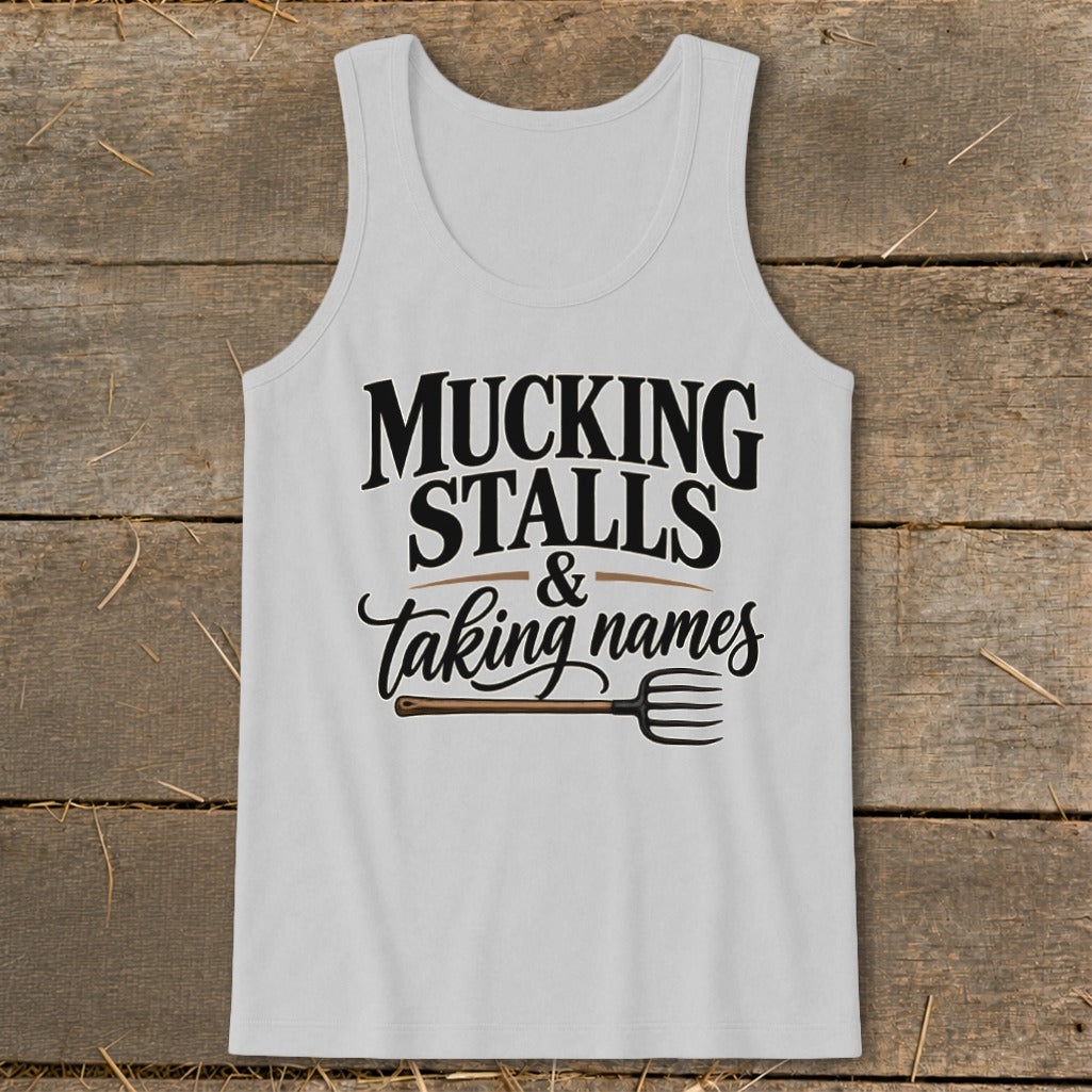 Tank top with "Mucking Stalls & Taking Names" text and a pitchfork graphic.