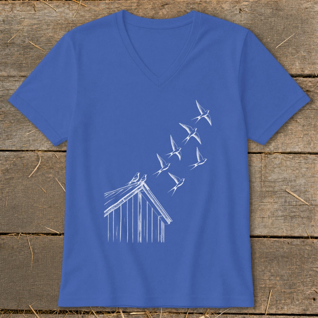 Blue V-neck t-shirt featuring a white line drawing of birds flying from a birdhouse roof.