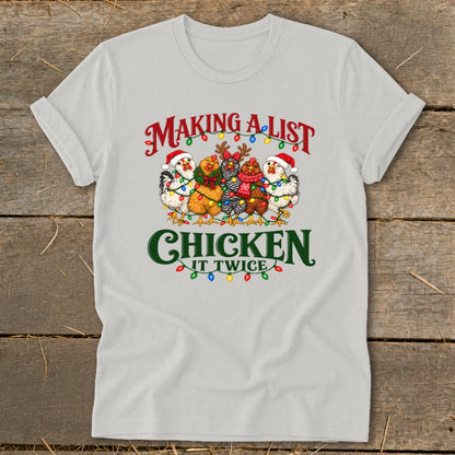 Christmas chickens wearing Santa hats and lights, "Making a list, chicken it twice" text.