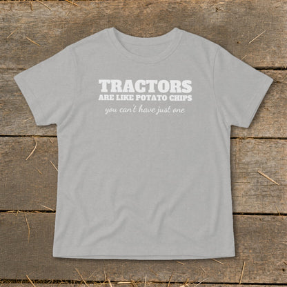 Grey t-shirt with white text: "Tractors are like potato chips, you can't have just one."