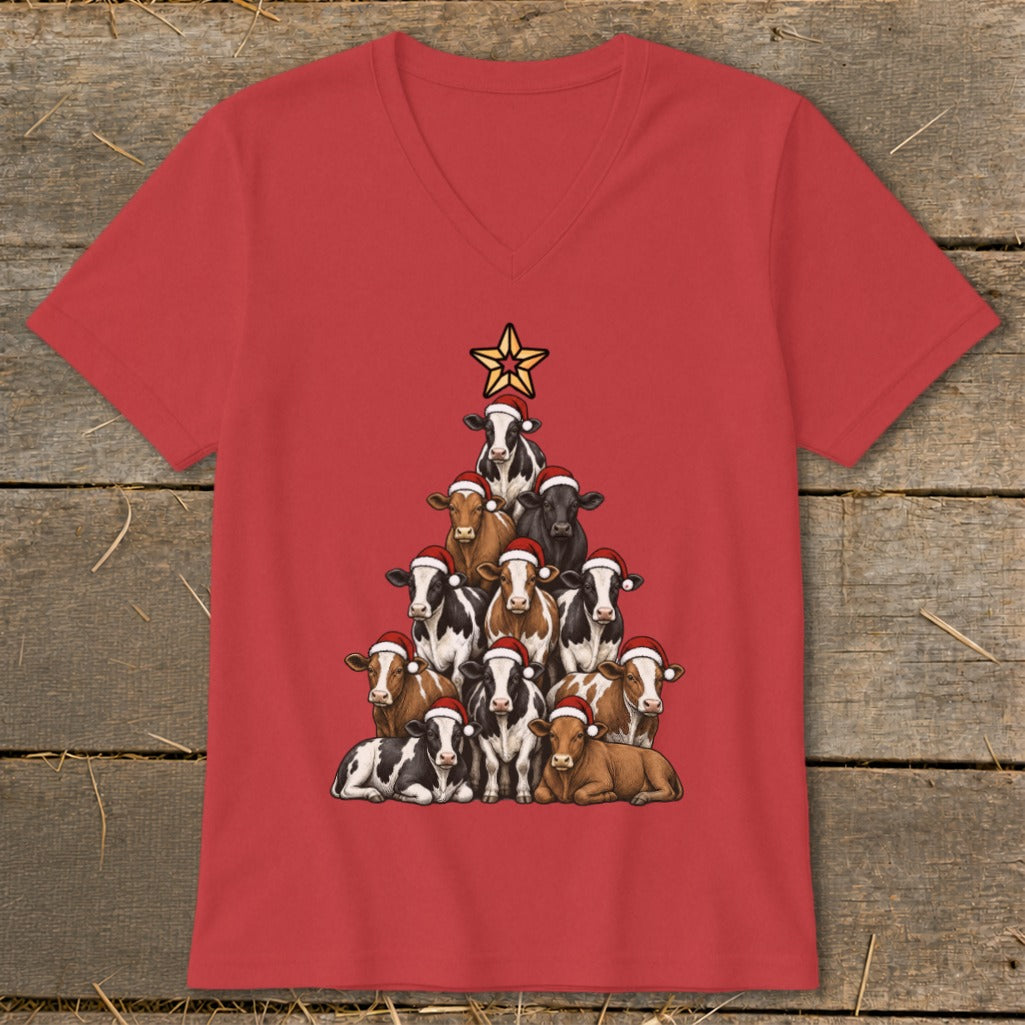 Red t-shirt with a Christmas tree made of cows wearing Santa hats and a star topper.