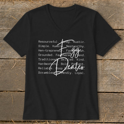 Black v-neck t-shirt with "Egg Dealer" and descriptive words in white text.