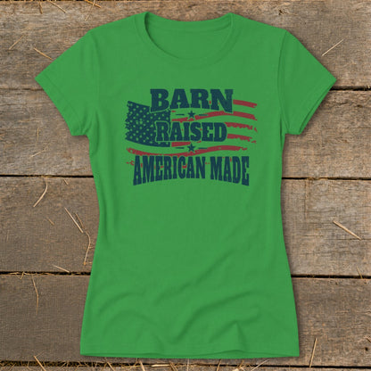 Green t-shirt with distressed American flag graphic and text "Barn Raised American Made".