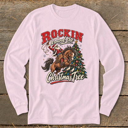 Santa riding a horse, lassoing a Christmas tree, with text "Rockin Around the Christmas Tree".
