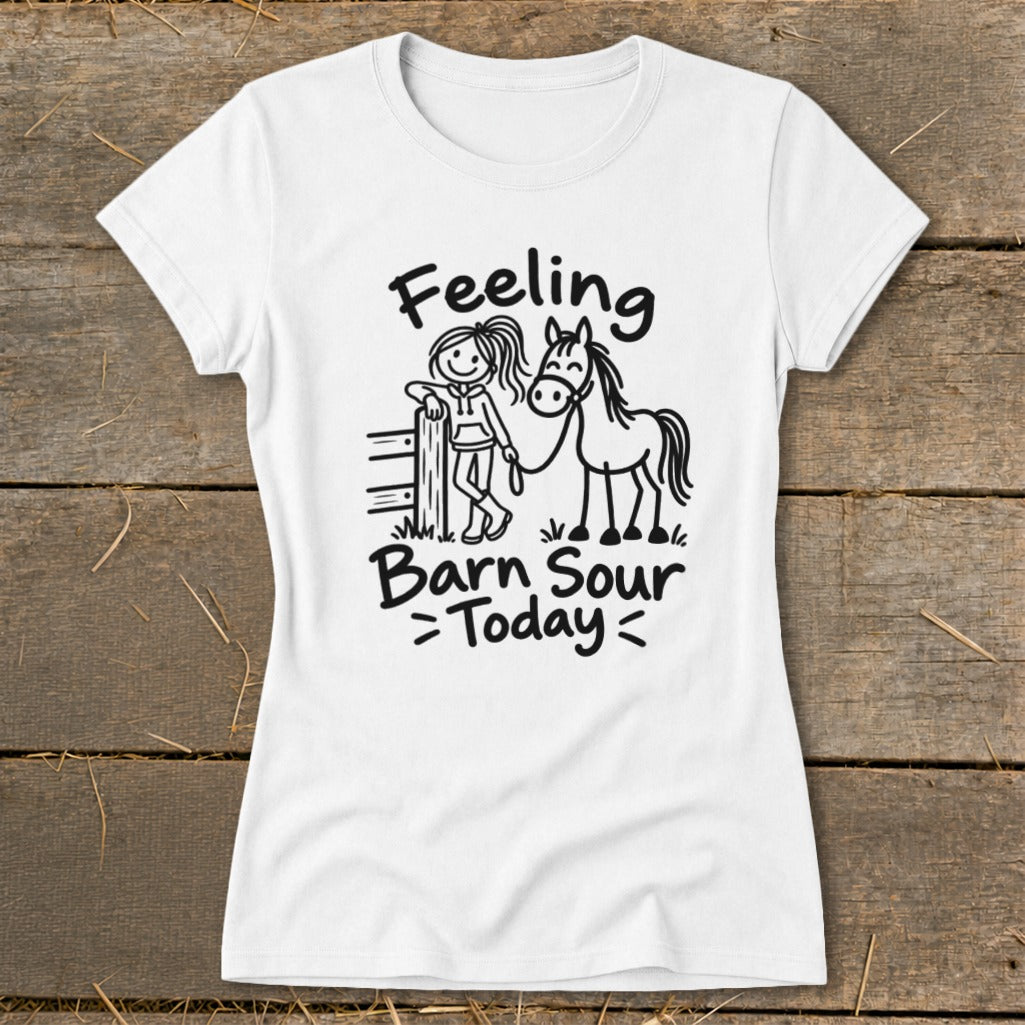 White t-shirt with "Feeling Barn Sour Today" text and girl with horse graphic.