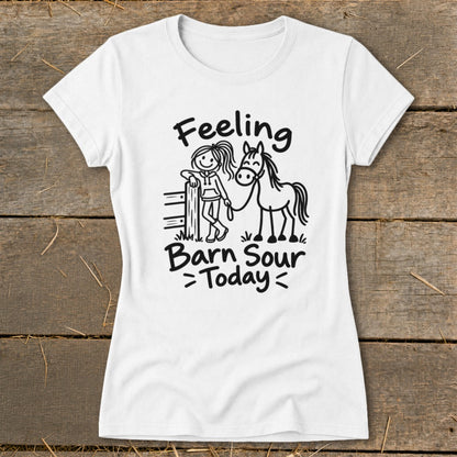 White t-shirt with "Feeling Barn Sour Today" text and girl with horse graphic.