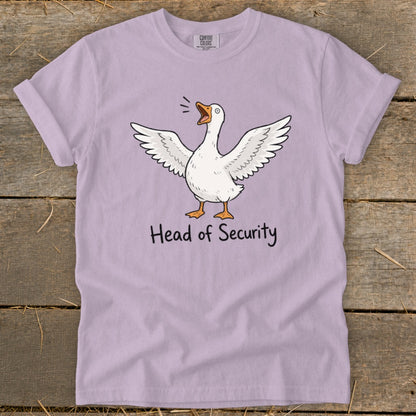 Light purple t-shirt with a cartoon goose flapping wings and text "Head of Security".