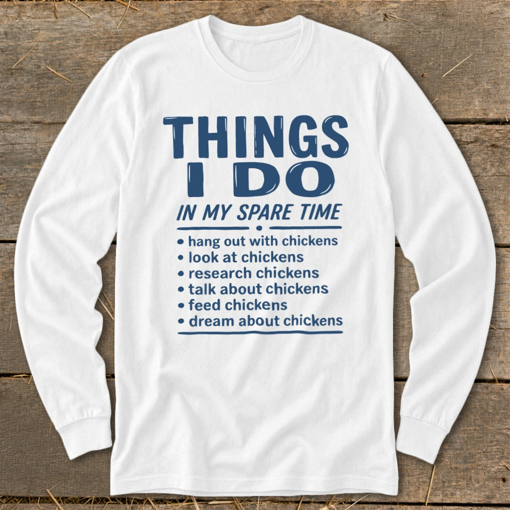 White long-sleeve shirt with "THINGS I DO IN MY SPARE TIME" and chicken-related activities.