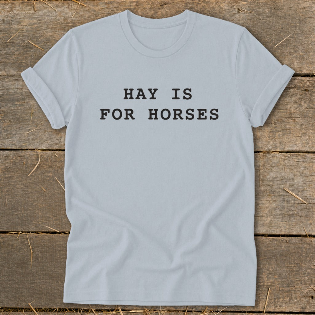 Light blue t-shirt with black text reading "HAY IS FOR HORSES".