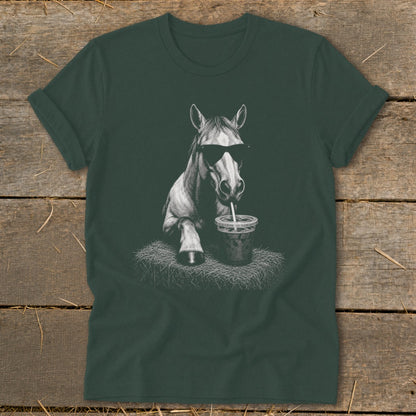 White line drawing of a horse wearing sunglasses and drinking from a cup on a dark green t-shirt.