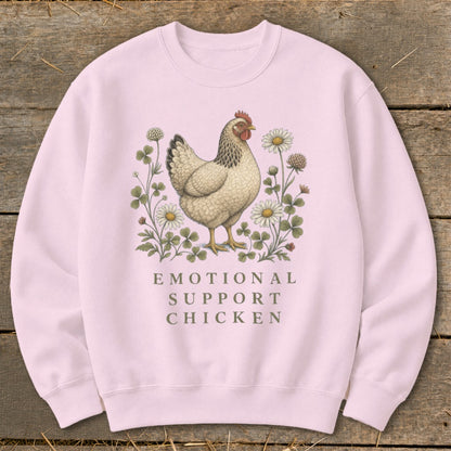 Pink sweatshirt with illustration of chicken surrounded by flowers and text "EMOTIONAL SUPPORT CHICKEN".