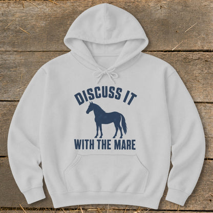 White hoodie with dark blue text "Discuss It With The Mare" and a horse silhouette.
