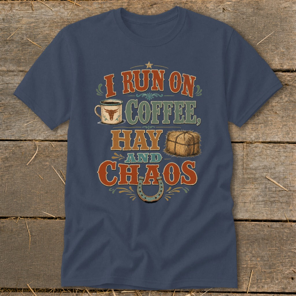 Navy t-shirt with "I RUN ON COFFEE, HAY AND CHAOS" text, coffee cup, hay bale, and horseshoe graphic.
