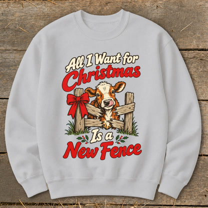 Light gray sweatshirt with a cow behind a fence, text reads "All I Want for Christmas Is a New Fence".