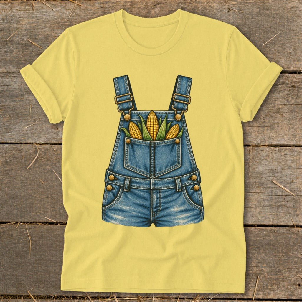 Yellow t-shirt with denim overalls graphic featuring three ears of corn.
