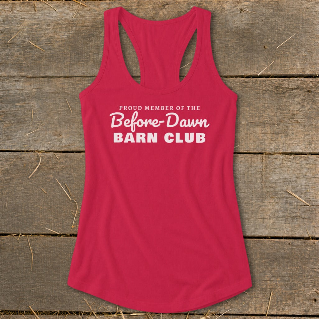 Pink racerback tank top with "Proud Member of the Before-Dawn Barn Club" text.