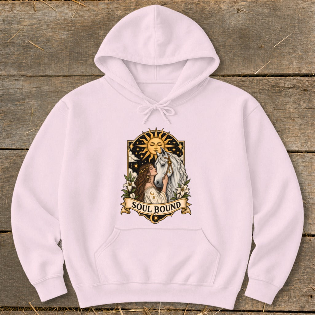 Pink hoodie with a "Soul Bound" graphic of a woman and horse with the sun and stars.