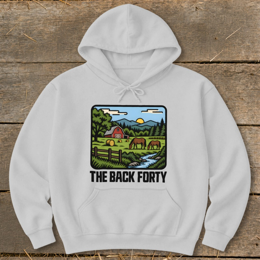 A light gray hooded sweatshirt with a graphic illustration of horses, a red barn, and the text The Back Forty.
