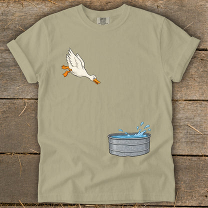 Cartoon duck jumping into a galvanized water tub with splashing water.