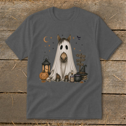 Horse in ghost costume with Halloween decorations and "Spooky Beware Boo!" sign.