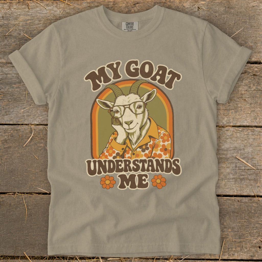 T-shirt graphic with a goat wearing glasses and text "MY GOAT UNDERSTANDS ME".