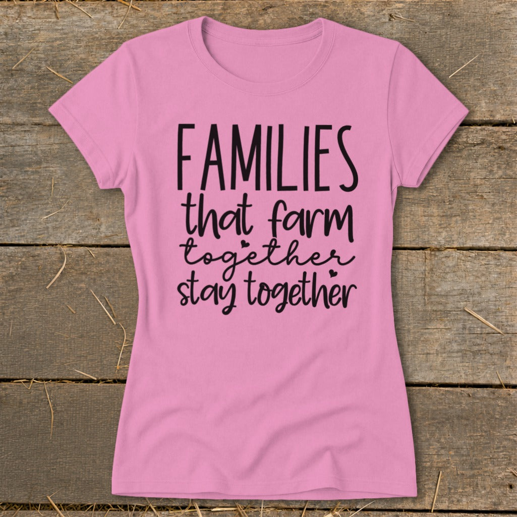 Pink t-shirt with "FAMILIES that farm together stay together" text design.