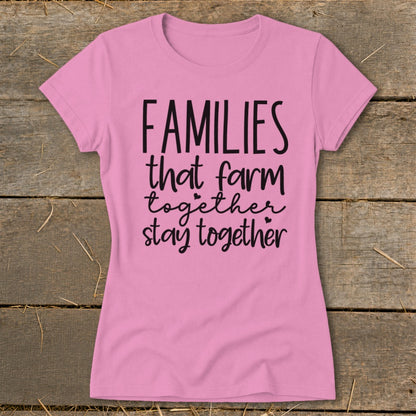 Pink t-shirt with "FAMILIES that farm together stay together" text design.