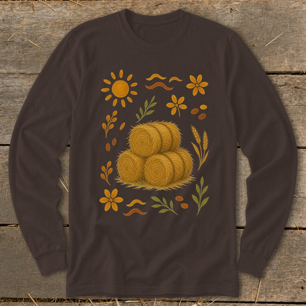 Brown long-sleeve shirt with hay bales and autumnal floral graphic.